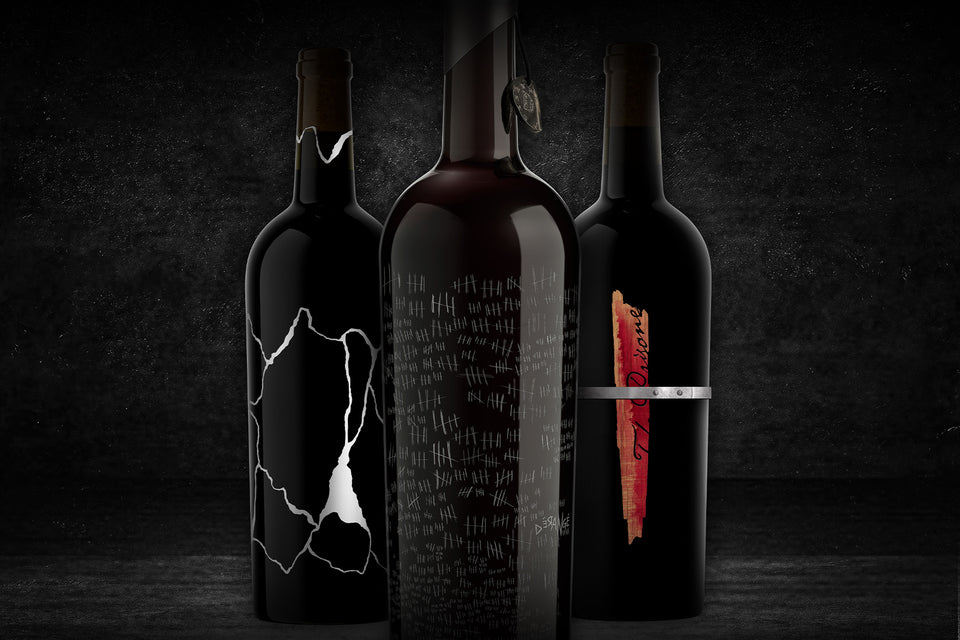 Sliver Solder and Derange bottles on a black background