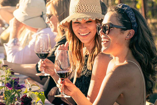 Women enjoying a glass of red wine
