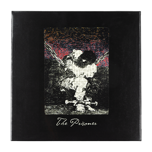 The Prisoner Red Blend logo puzzle on a gray background