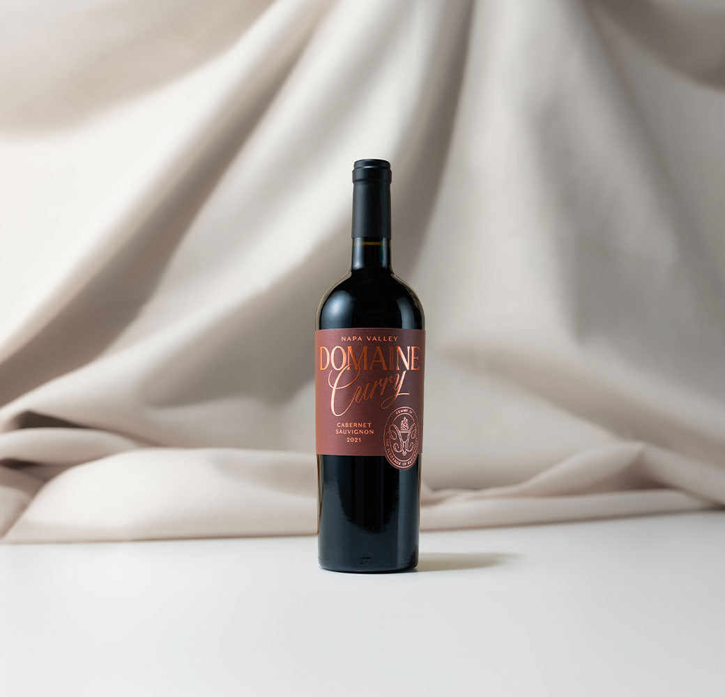 Domaine Curry Cabernet Sauvignon with white curtain background