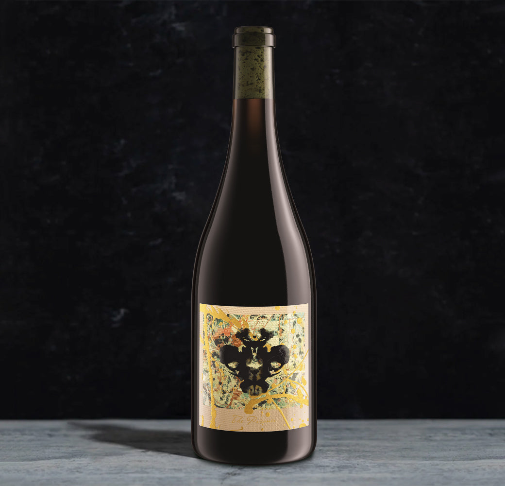 A bottle of The Prisoner Winemaker's Series Grenache on a textured black background