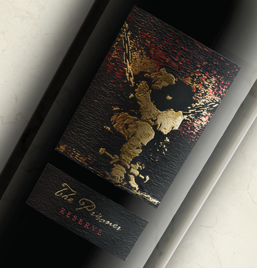 A closeup of the label of a bottle of The Prisoner Reserve Red Blend 