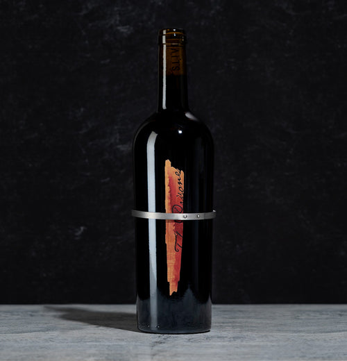Bottle of The Prisoner Sliver Red Blend on a black background