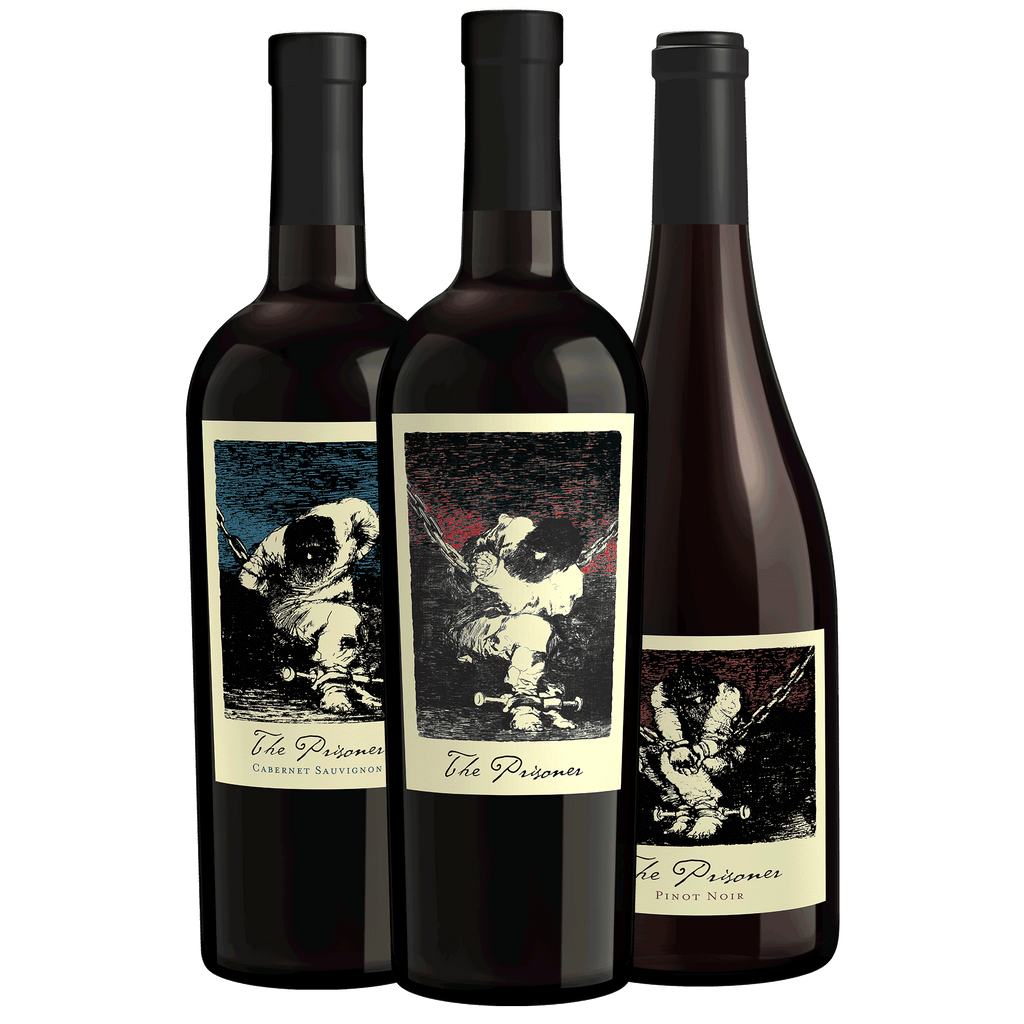 Three dark wine bottles with black capsules and cream labels featuring black-and-white artwork and the brand name 'The Prisoner' on a white background.