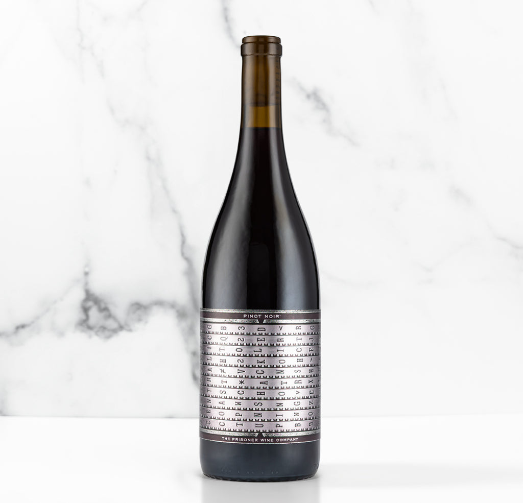 Unshackled Pinot Noir bottle on a white background