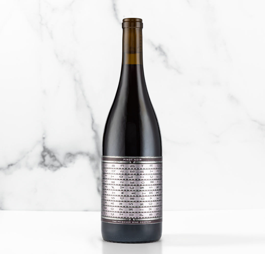 Unshackled Pinot Noir bottle on a white background