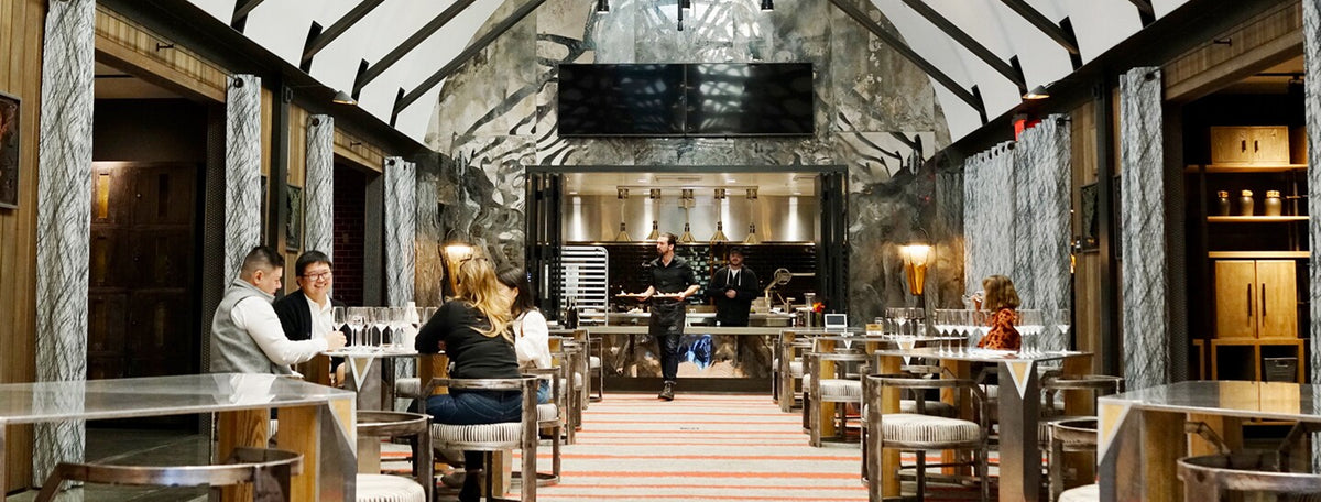 The Makery with a server walking to a table