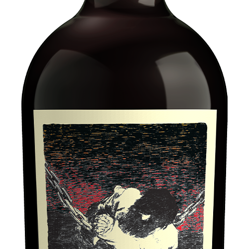 A close-up of a dark glass bottle with a cream label featuring a black, red, and cream graphic illustration of a figure in chains.