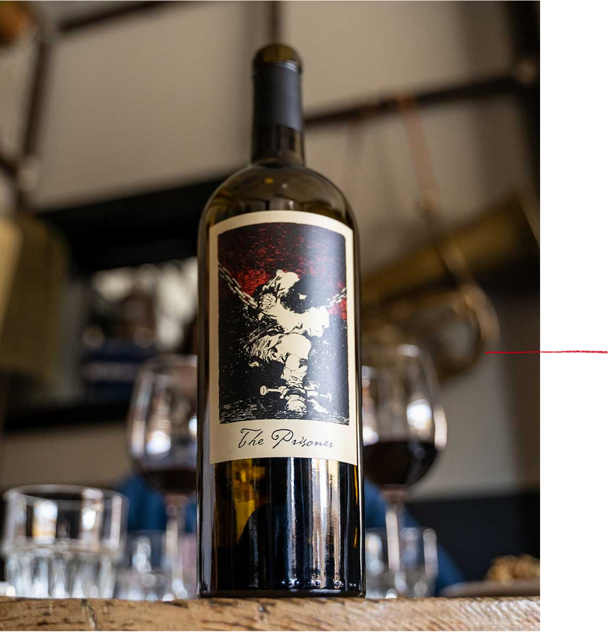 The Prisoner Red Blend on a table from below