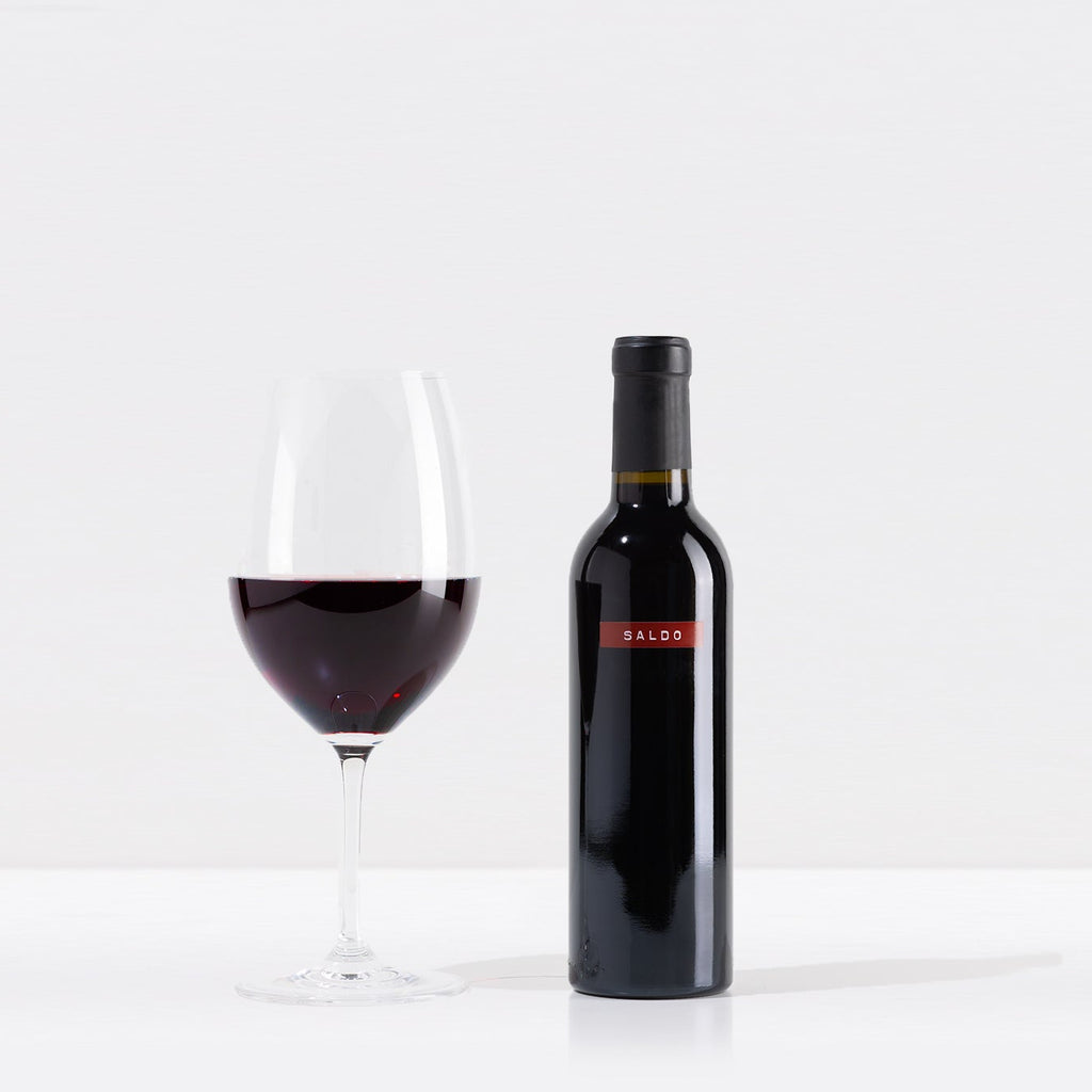A bottle of SALDO ZINFANDEL 375mL on a gray background