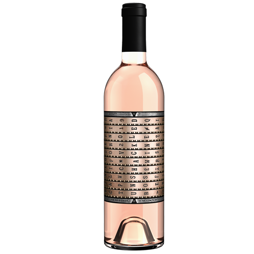 A bottle of 2019 Unshackled Rose California on a gray background with the label facing forward.